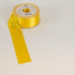 730 - DC Exclusive Lint 40 mm - Mais geel