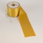 948 - DC Exclusive Lint 70 mm - Goud